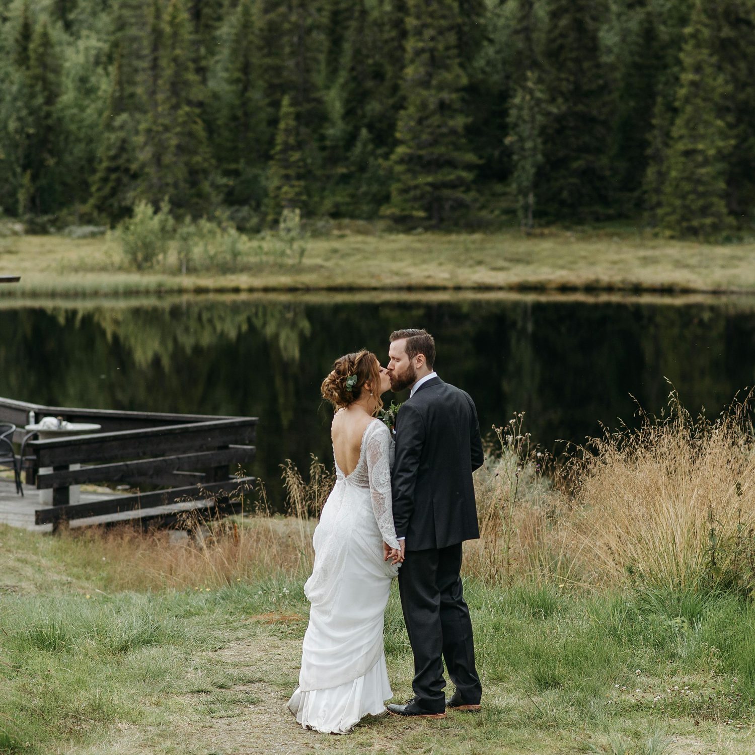 Bride and groom posing at Weaselhead Flats